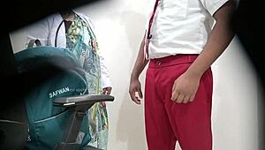 A girl is being examined by a woman doctor at school