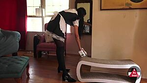 French maid bends over while vacuuming in tight skirt and stockings