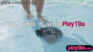 Busty milf strips in the pool, showing wobbly boobs