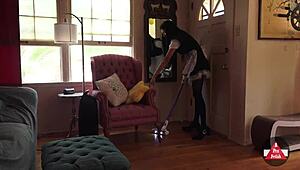 French maid bends over while vacuuming in tight skirt and stockings