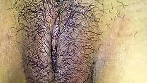 Slut paints clitoris close-up