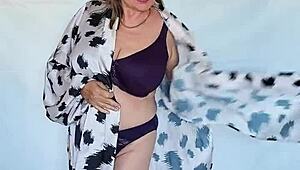 OMG, this busty mature milf in stockings and heels just keeps the sexy story going forever!