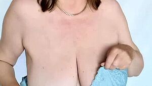 OMG, this busty mature milf in stockings and heels just keeps the sexy story going forever!