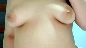 A cute fat girl is having fun in her bedroom