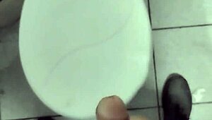 Masturbating alone at work in a solo session.