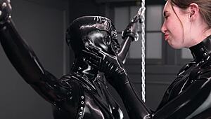 tied in latex, she reaches orgasm from vibrators 😈