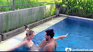 Blonde in Bikini Enjoys Pool Time