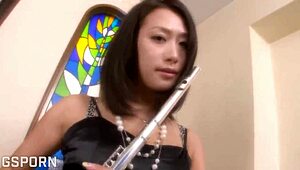 Yo, this Japanese musician girl craves hard cocks in wild foursome