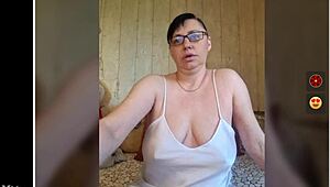 Tia Lucia shows off big nipples while dancing on camera.