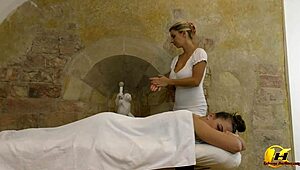 Katerina hartlova massages busty babe domii with lots of oil