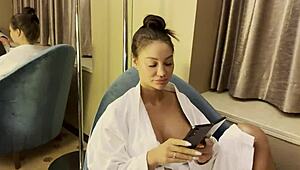 Monika Fox masturbates her shaved pussy in the shower at home, showing big tits