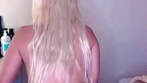 blonde with huge tits twerks oiled massive buttocks
