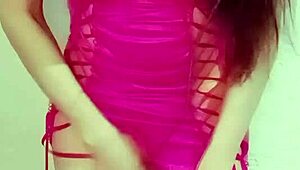 Young Latina Dances In Pink Dress
