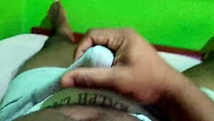 man strokes his black cock solo in handjob session