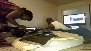 In the hood, a thick ebony milf strips naked on the street.