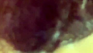 playing with my dildo and reaching climax on it