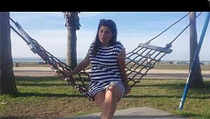 Naked girl bent over on the public beach today.