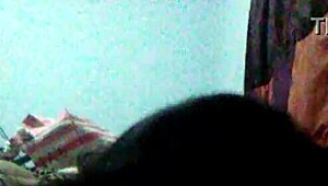 She sucks a fat black cock while her boyfriend watches