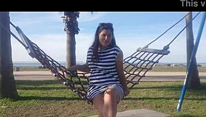 Naked girl bent over on the public beach today.