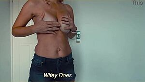 Blonde milf wife slowly strips out of tight denim shorts for homemade tease. Her big tits steal the show!