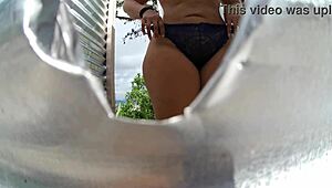 curvy latina caught on camera in beach cabin wearing sexy lingerie