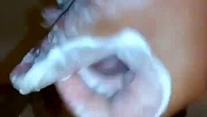 I'm in the shower, stroking my cock under warm water, feeling aroused