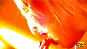 Two Attractive Women Enjoy Each Other With A Toy On The Stairs