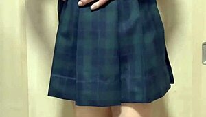 Teen in School Uniform with Anal Plug