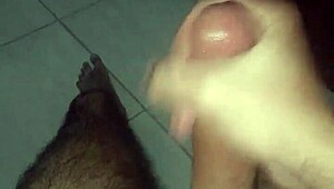 this brazilian guy is masturbating his monster cock and cumming so hard 😩