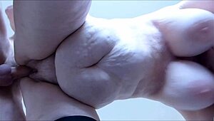 Mature amateur BBW with huge tits gets titty fucked and vaginal penetration