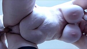 Mature amateur BBW with huge tits gets titty fucked and vaginal penetration