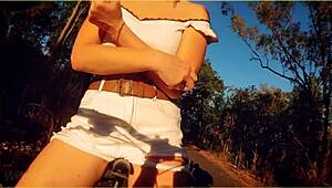 yo, this amazing milf flashing her big tits on a public bike ride... unreal! 😍