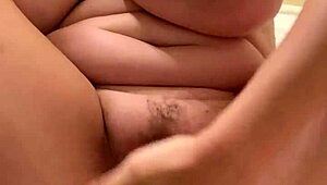 amateur milf with massive tits dildos her pussy, tries squirting but pees 😅