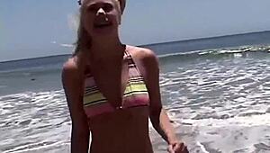 Little summer intensely shows her natural tits and pussy at the beach, getting fingered by blonde teen.