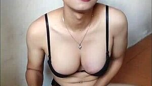 hey, see this shemale cum hard in black bra?