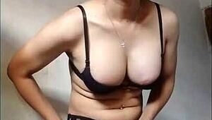 hey, see this shemale cum hard in black bra?