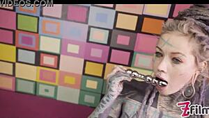 Tattooed Alternative Pornstar Anuskatzz in Corset Plays with Metal Toy