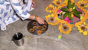 celebrating diwali with housewife and family in homemade setting