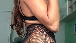 Izabela, the shemale goddess, shows off her big tits and monster cock in lingerie