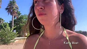 Crazy girl pees on public beach!