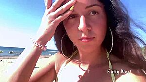 Crazy girl pees on public beach!