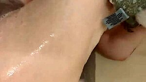 i ripped my clothes off in the shower, feeling those big natural tits oiled up, reaching orgasm in the bath.