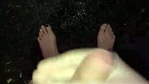 I'm masturbating in the rain, naked with my big cock out