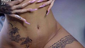 Listen to Susy Gala moan softly as she plays with her anal plug and dildo in lingerie