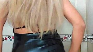 transsexual in the bathroom touching herself suggestively