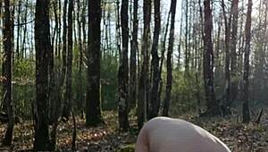 Slave self-spanks outdoors like a sow