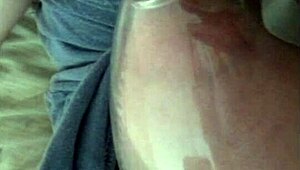 This lactating babe deepthroats and swallows milk while sucking tits in a casual scene.
