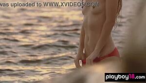 Demi Fray, a petite ukrainian babe, playfully strips naked outdoors