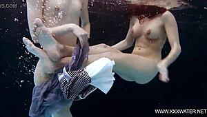 shaved brunette with big tits bathes in pool and shower underwater