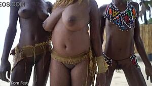 Три африкански племенни вещици изпълняват танцувален ритуал за дъжд